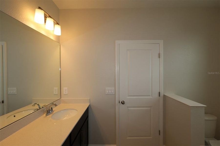 Furnished interior view inside a new home in Center Lake on the Park, St. Cloud (Image 9).