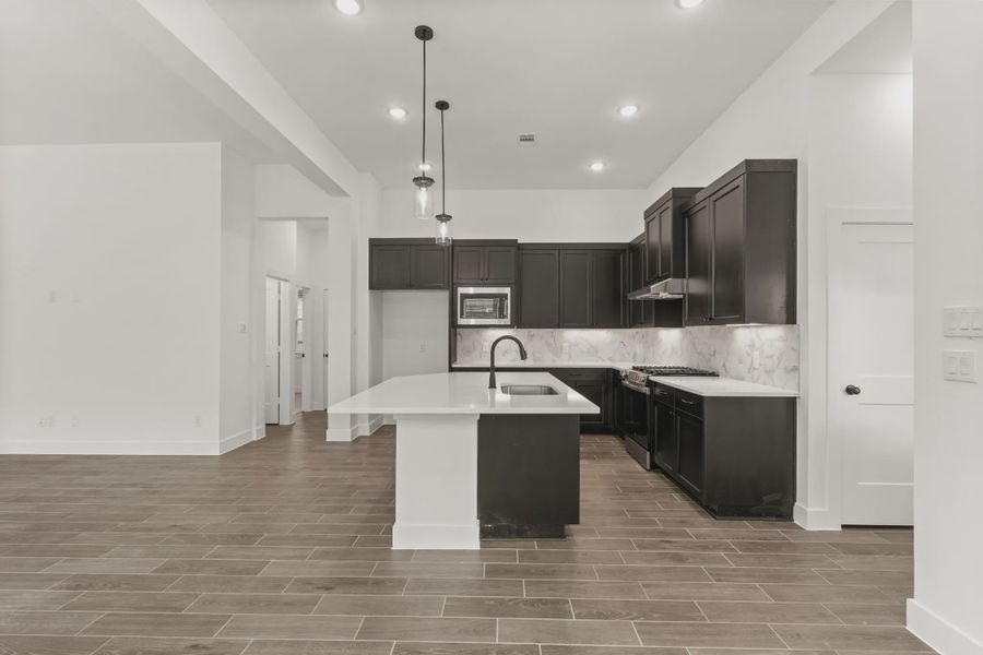 Representative furnished interior of a home built from the Rowen by Chesmar Homes in Brookewater 45's, Rosenberg (Image 5).