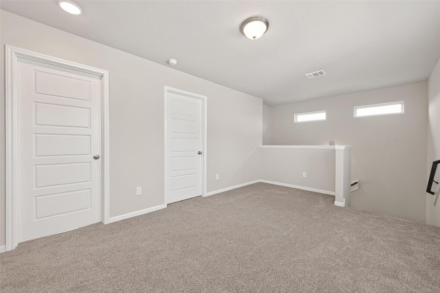Spacious, unfurnished interior of a new home in Woodland Lakes, Huffman (Image 34).
