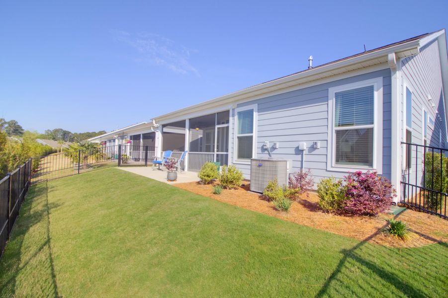 Exterior details and patio area of a home in Cresswind Charleston, Summerville (Image 31).