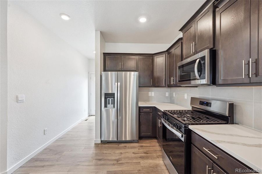Furnished interior view inside a new home in Horizon Uptown, Aurora (Image 13).