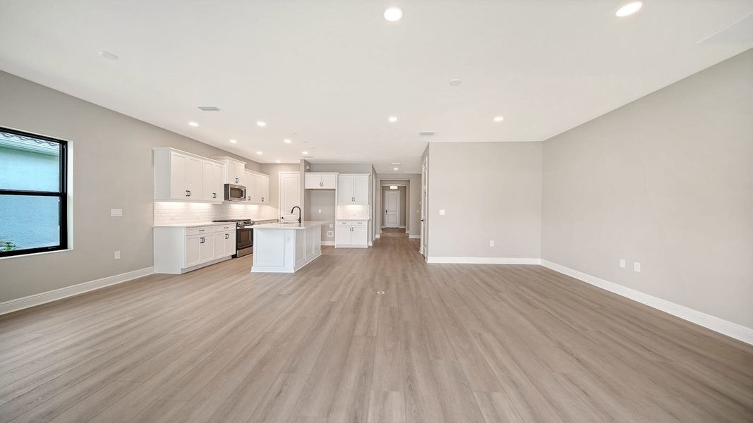 Spacious, unfurnished interior of a new home in Windward Real Estate and Homes for Sale in Sarasota, FL - Neal Communities, Lakewood Ranch (Image 35).