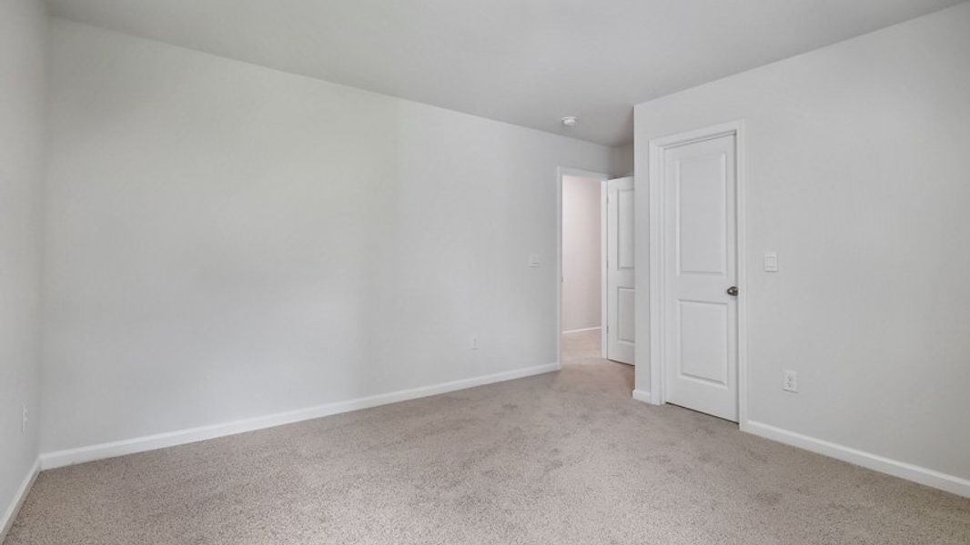 Spacious, unfurnished interior of a new home in The Estates at Edinborough, Gibsonville (Image 33).