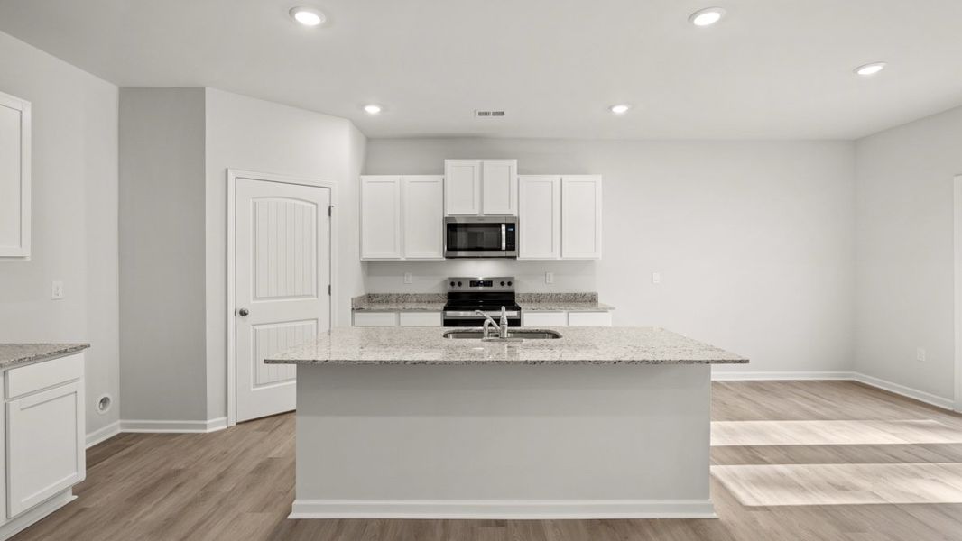 Representative furnished interior of a home built from the Hayden by D.R. Horton in Aurora Creek, Dallas (Image 5).