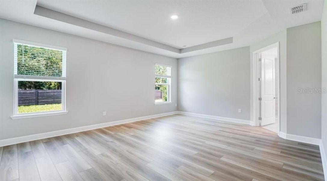 Spacious, unfurnished interior of a new home in The Cove at West Port, Port Charlotte (Image 14).