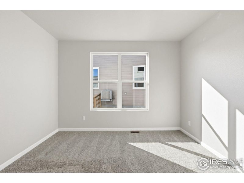 Spacious, unfurnished interior of a new home in Cordovan, Longmont (Image 24).