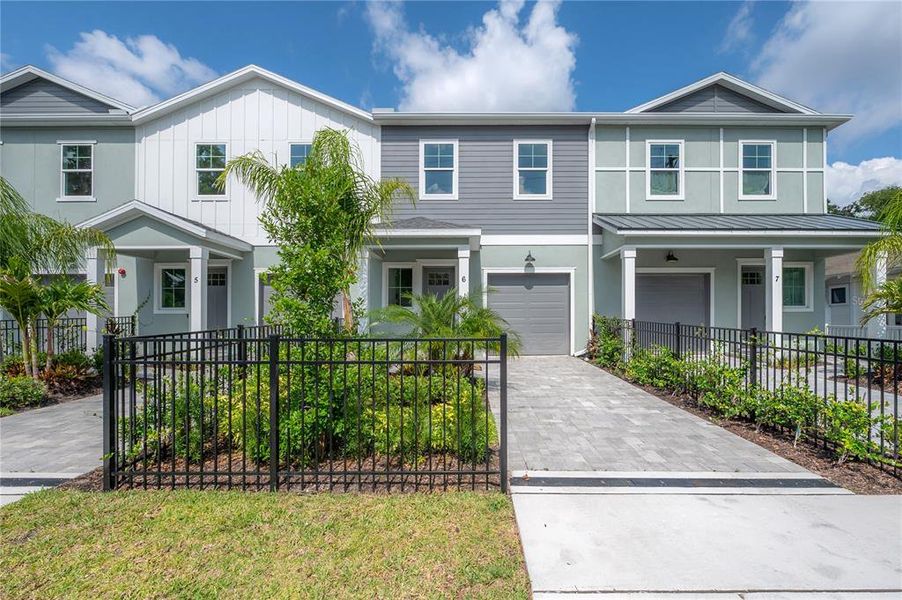 Front exterior of a new home in , Tampa, FL, highlighting curb appeal (Image 25).