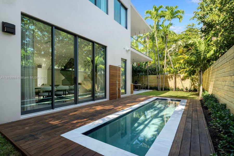 Exterior details and patio area of a home in , Miami (Image 2).