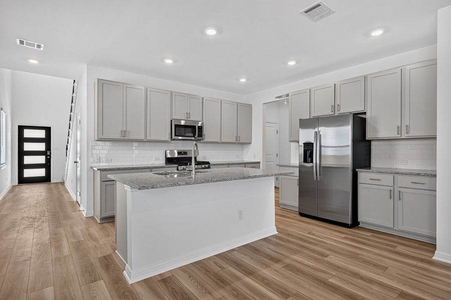 Furnished interior view inside a new home in Sunfield, Buda (Image 10).