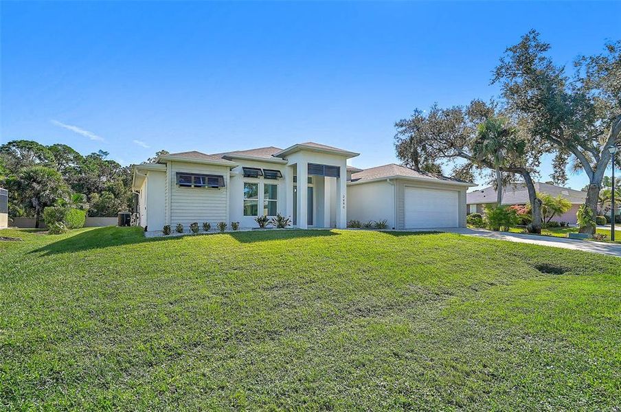 Exterior details and patio area of a home in , Port Charlotte (Image 26).