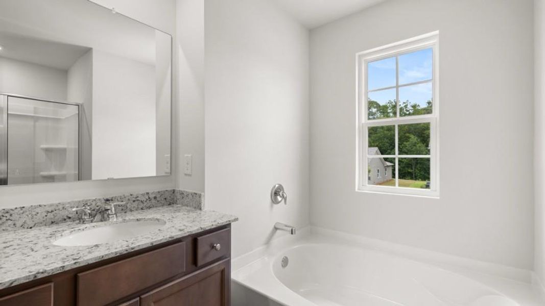 Furnished interior view inside a new home in Northwoods at Mirror Lake, Villa Rica (Image 9).