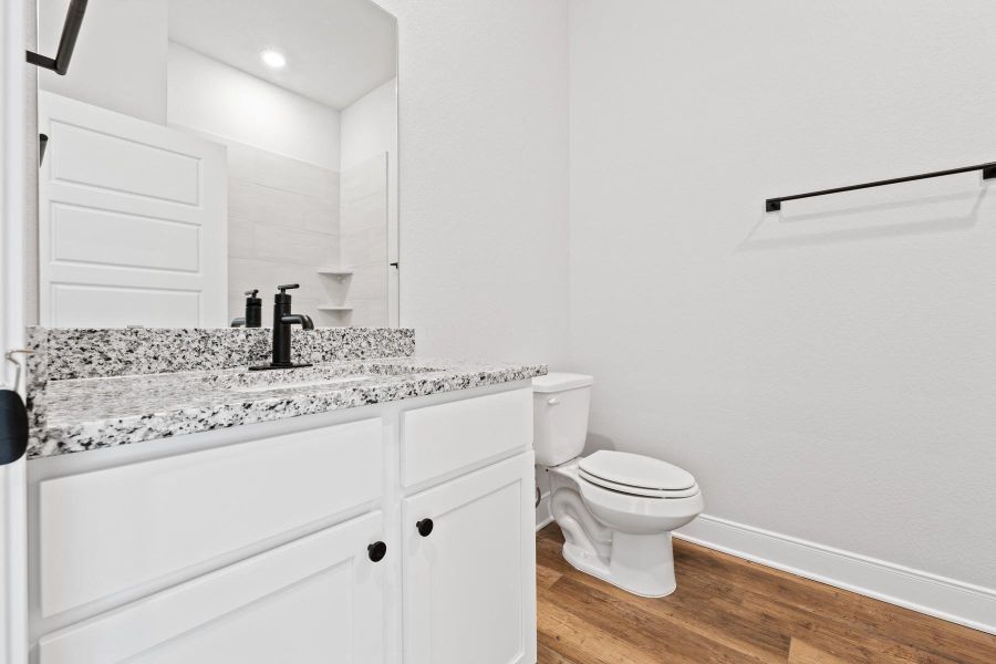 Furnished interior view inside a new home in TRACE, San Marcos (Image 8).