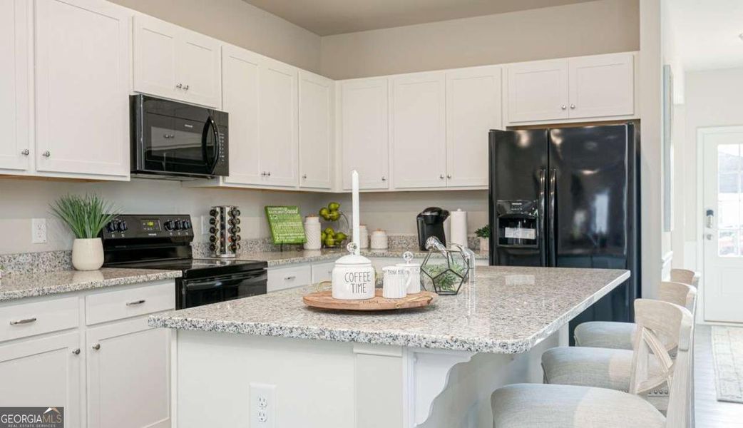 Furnished interior view inside a new home in The Cottages of Silvertown, Thomaston (Image 13).