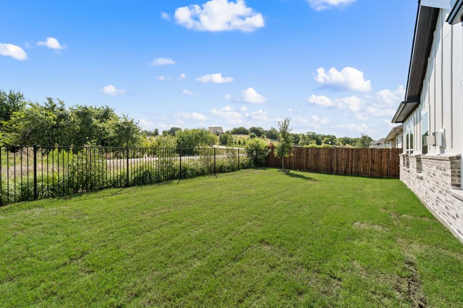 Exterior details and patio area of a home in Parks of Aledo, Aledo (Image 27).