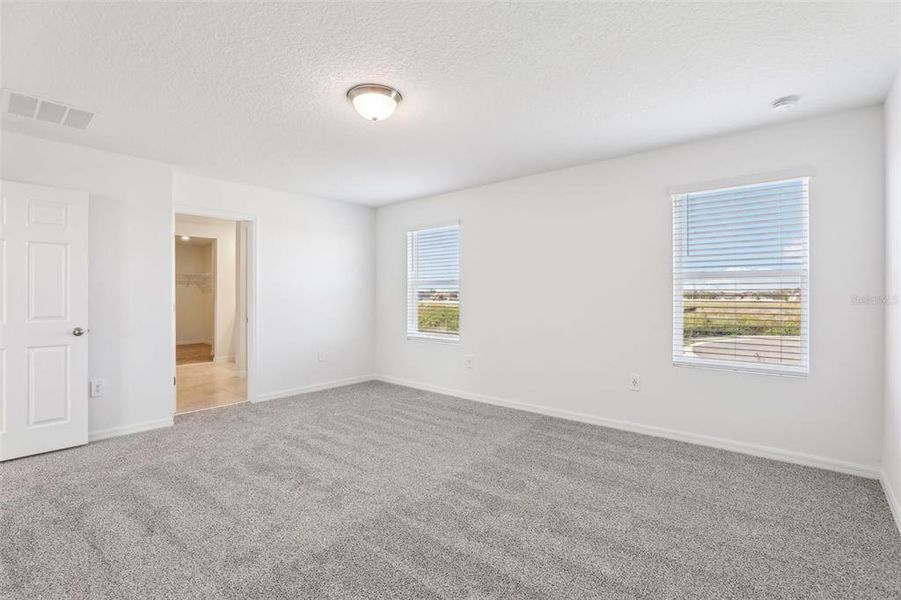 Spacious, unfurnished interior of a new home in Lake Deer Estates - Signature Series, Poinciana (Image 35). Spacious, unfurnished interior of a new home in Lake Deer Estates - Signature Series, Poinciana (Image 35).