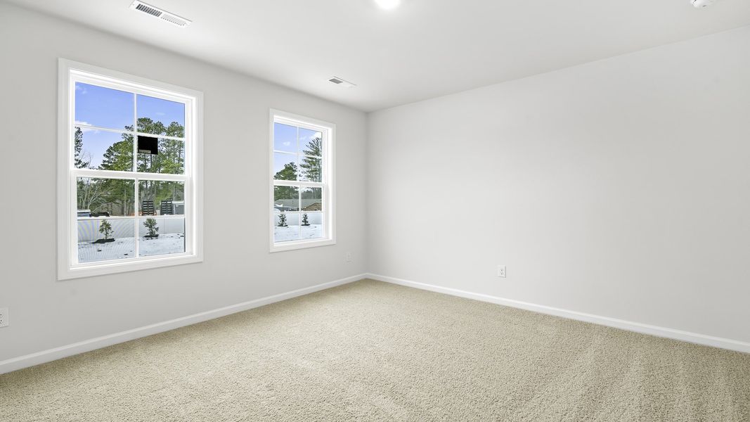 Spacious, unfurnished interior of a new home in Lybrook Village, Advance (Image 13).