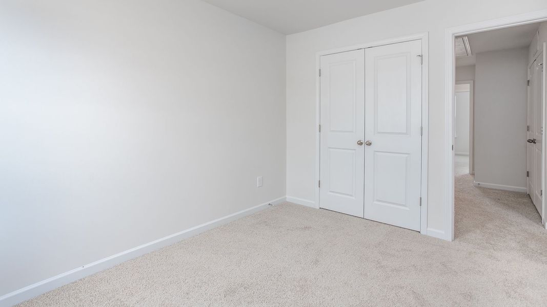 Spacious, unfurnished interior of a new home in The Gables at Edinborough Townes, Gibsonville (Image 18).