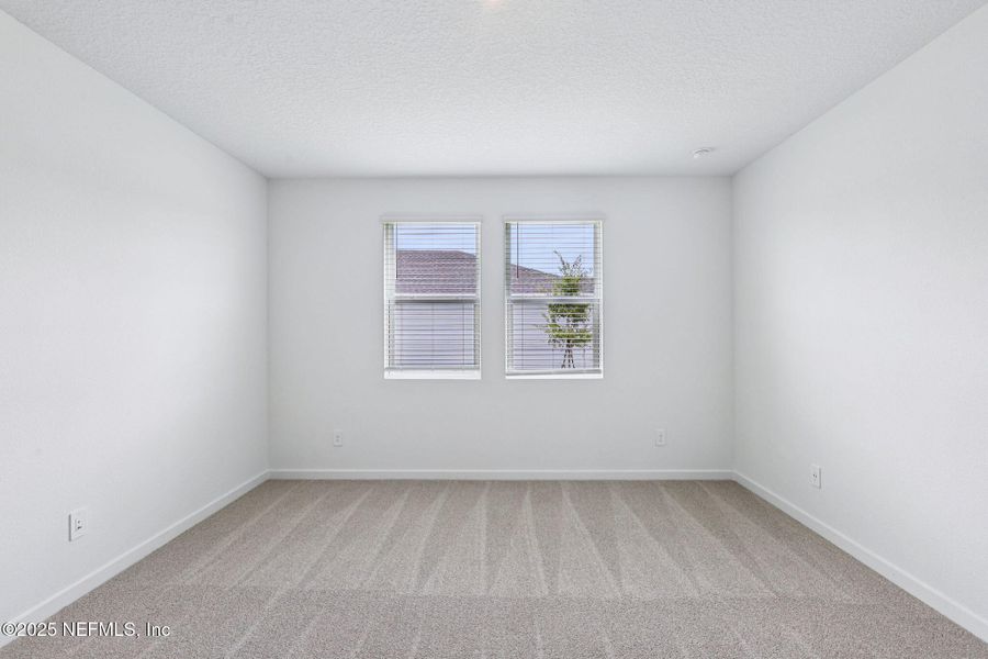 Spacious, unfurnished interior of a new home in Flagler Village - Signature Series, Palm Coast (Image 14).