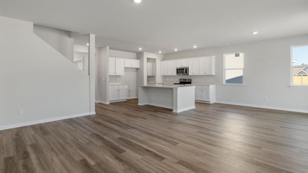 Representative unfurnished interior of a home built from the HARBOR OAK by D.R. Horton in Indigo Preserve, Leland (Image 31).
