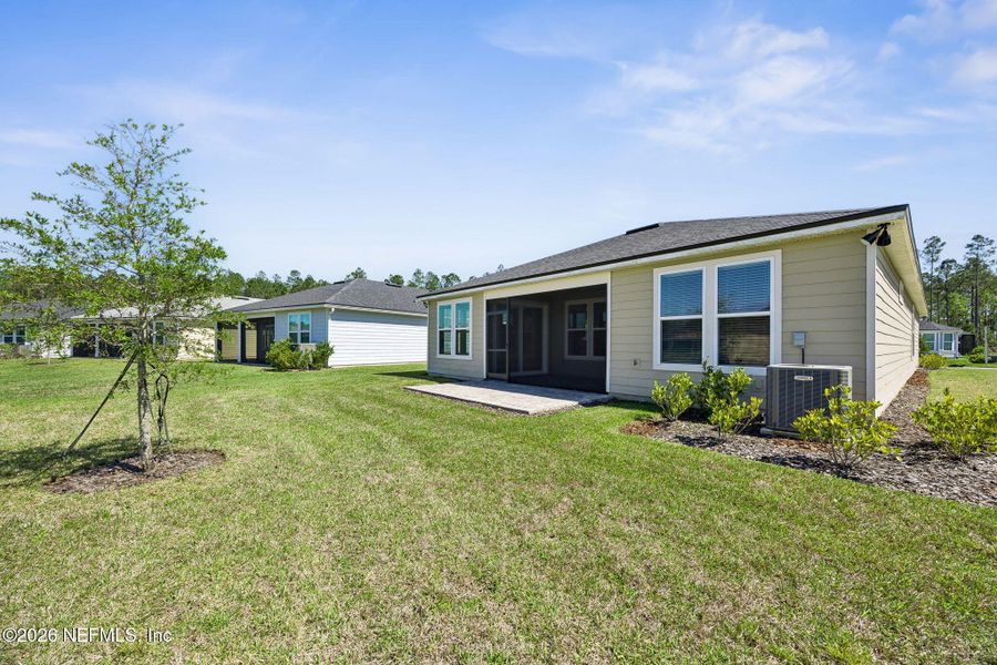 Exterior details and patio area of a home in , Yulee (Image 25).