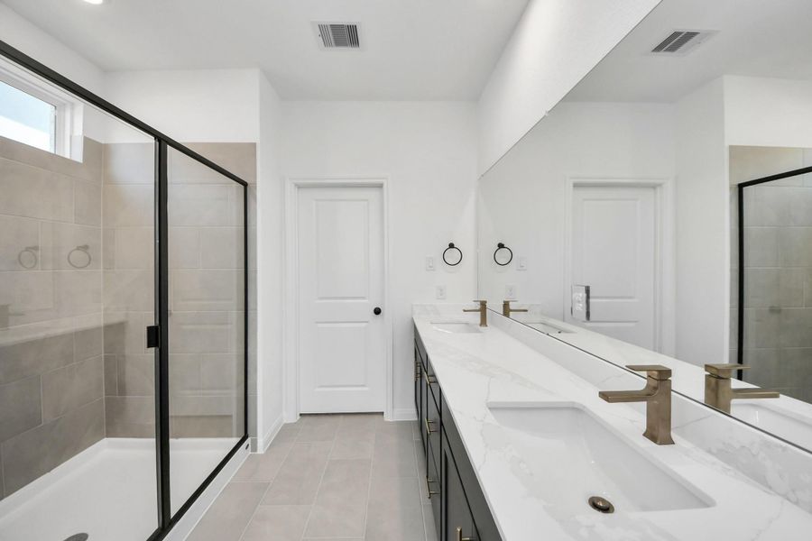 Furnished interior view inside a new home in 50' Traditional Homes at Elyson, Katy (Image 12).