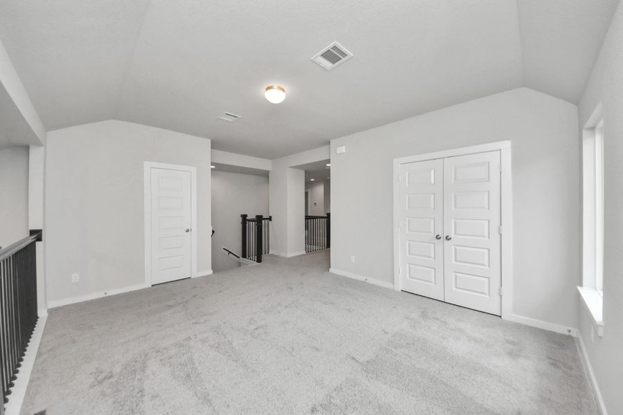 Discover a haven of leisure in this fantastic game room! Whether you're seeking a casual hangout or an adult gaming retreat, this space has it all. Enjoy the luxurious feel of plush carpet underfoot, the expansive ambiance of high ceilings, custom paint that adds a touch of personality, and windows that flood the room with refreshing natural light. Discover a haven of leisure in this fantastic game room! Whether you're seeking a casual hangout or an adult gaming retreat, this space has it all. Enjoy the luxurious feel of plush carpet underfoot, the expansive ambiance of high ceilings, custom paint that adds a touch of personality, and windows that flood the room with refreshing natural light.