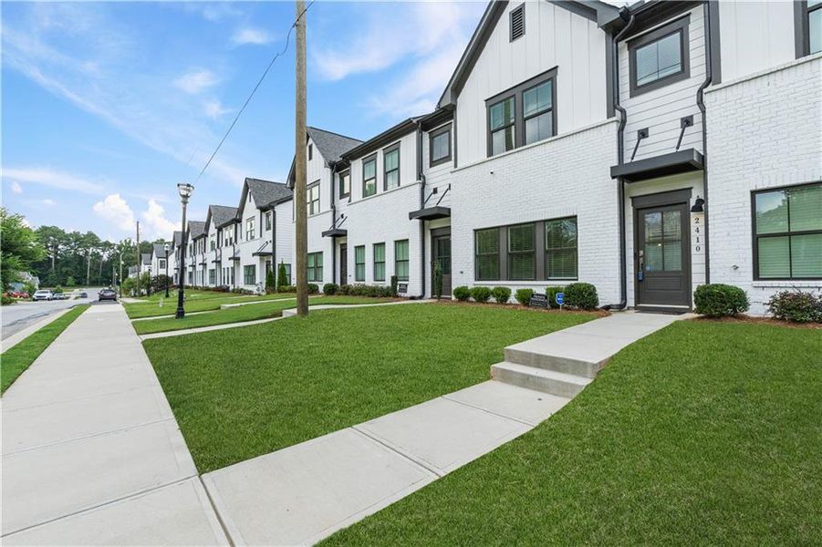 Front exterior of a new home in , Atlanta, GA, highlighting curb appeal (Image 16).