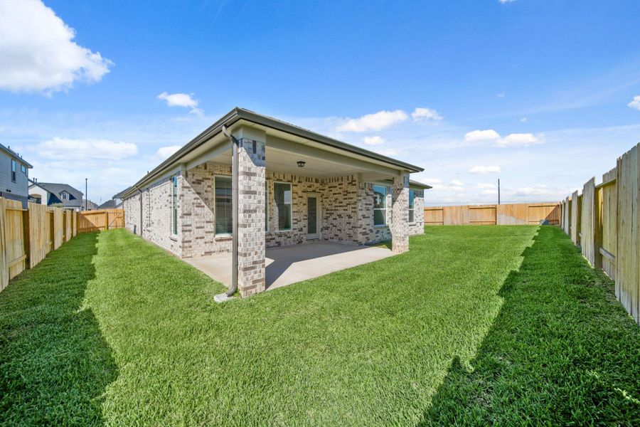 Exterior details and patio area of a home in Beacon Hill, Waller (Image 16). Exterior details and patio area of a home in Beacon Hill, Waller (Image 16).