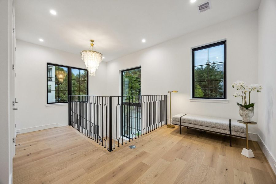 Light filled second floor landing.