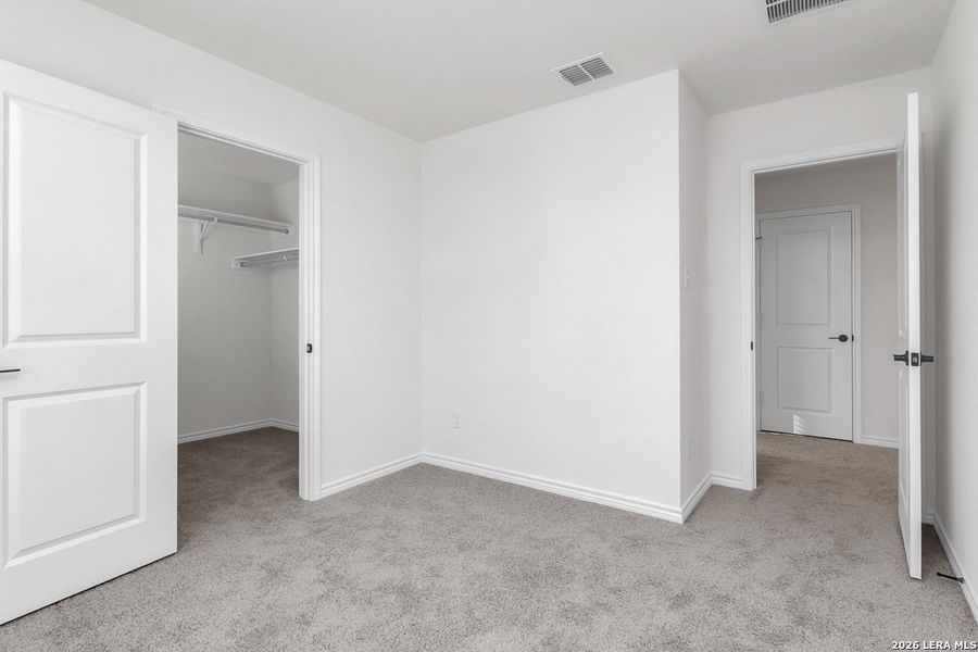 Spacious, unfurnished interior of a new home in Preserve at Culebra - Heritage Collection, San Antonio (Image 17).