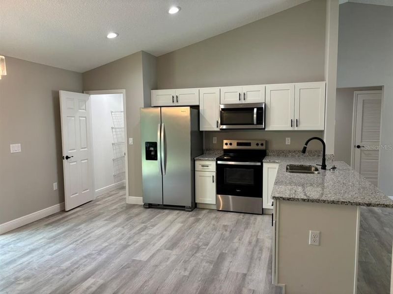 Furnished interior view inside a new home in , Dunnellon (Image 8).
