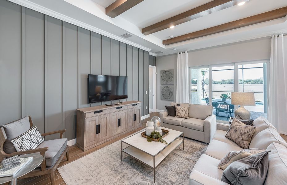 Spacious gathering room with sliding glass doors with lanai access