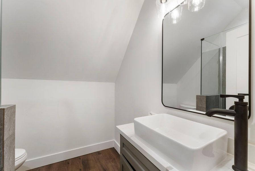 Upstairs full bath with walk-in shower.