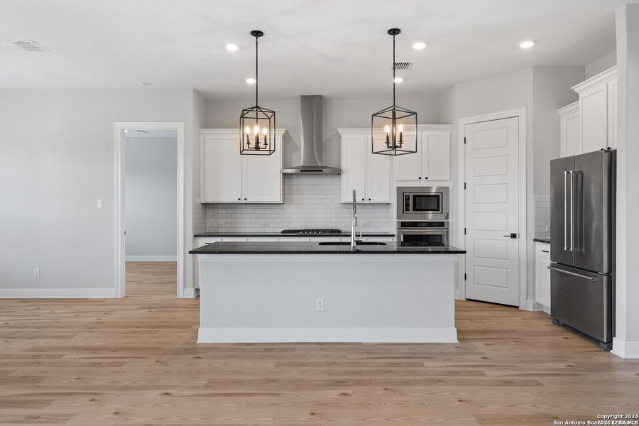 Furnished interior view inside a new home in Potranco West, Castroville (Image 10).