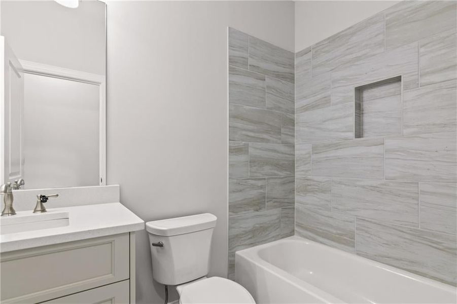 Furnished interior view inside a new home in Bellwyn, Johns Creek (Image 18).