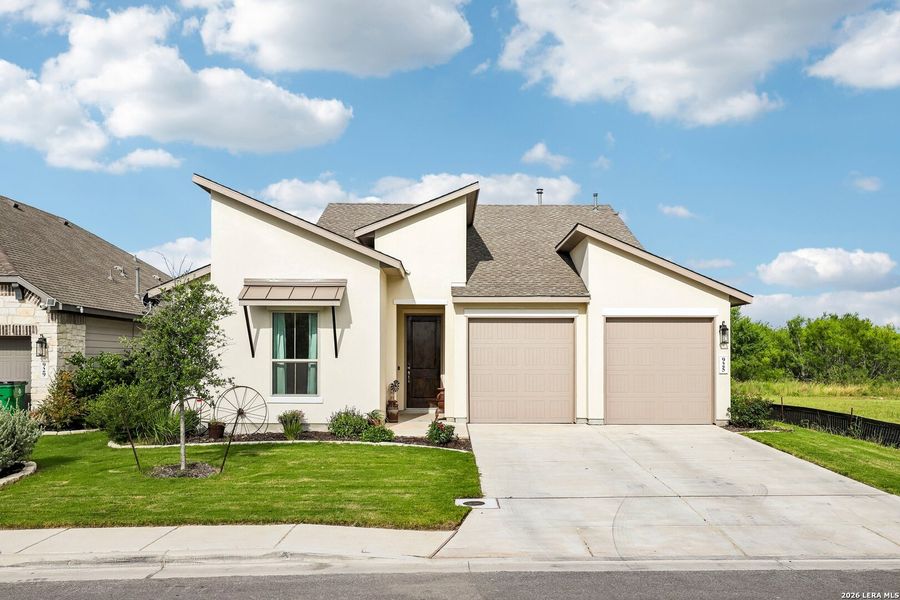 Front exterior of a new home in Nolte Farms, Seguin, TX, highlighting curb appeal (Image 2). Front exterior of a new home in Nolte Farms, Seguin, TX, highlighting curb appeal (Image 2).