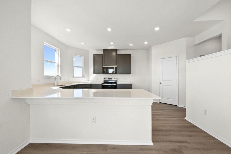 Furnished interior view inside a new home in Stoney Chase, Del Valle (Image 11).
