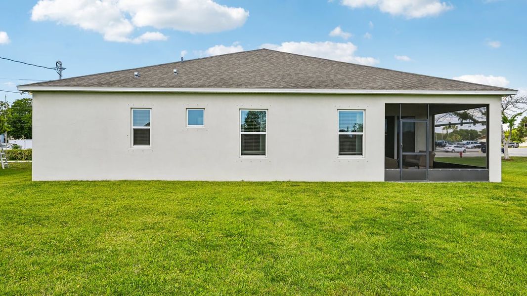 Exterior details and patio area of a home in Vero Lake Estates, Vero Beach (Image 3).