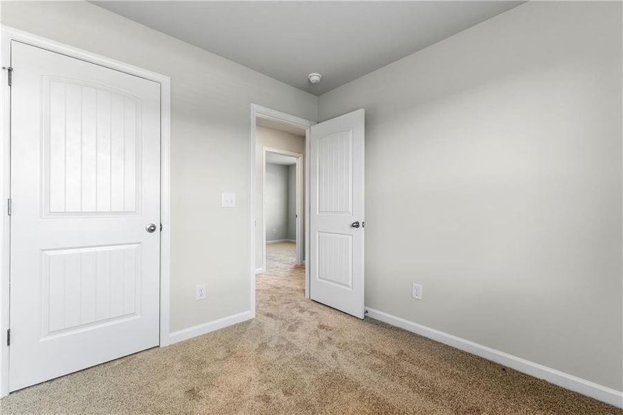 Spacious, unfurnished interior of a new home in The Grove At Mundy Mill, Gainesville (Image 28).