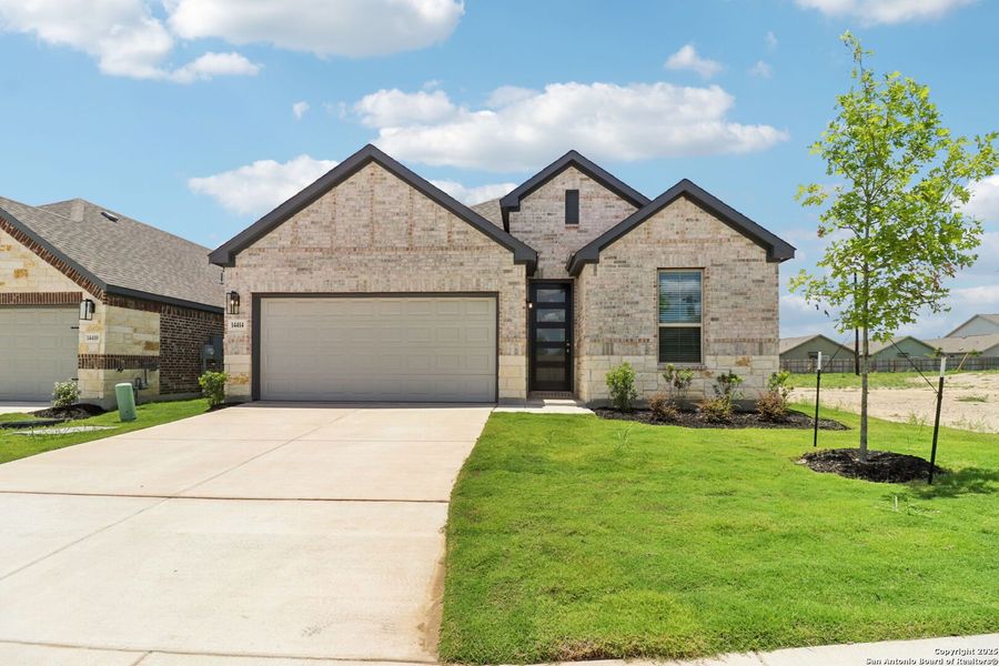 Front exterior of a new home in Kallison Ranch, San Antonio, TX, highlighting curb appeal (Image 24).