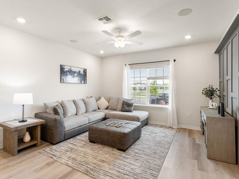 Enjoy an open living area in your new townhome in St. Cloud - Flora townhome by Highland Homes