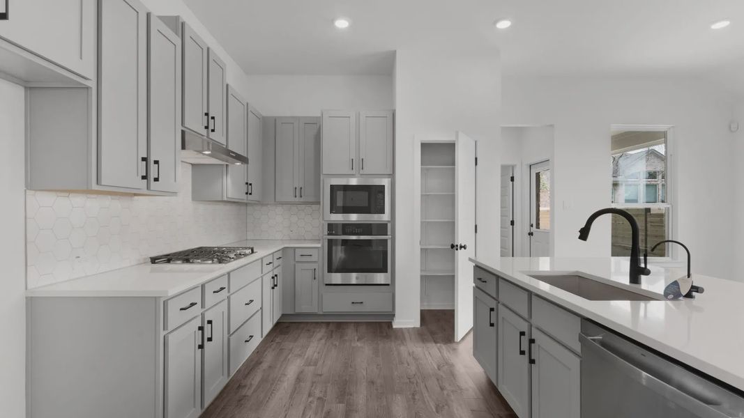 Representative furnished interior of a home built from the Aventura by Chesmar Homes in Parkside on the River, Georgetown (Image 7).