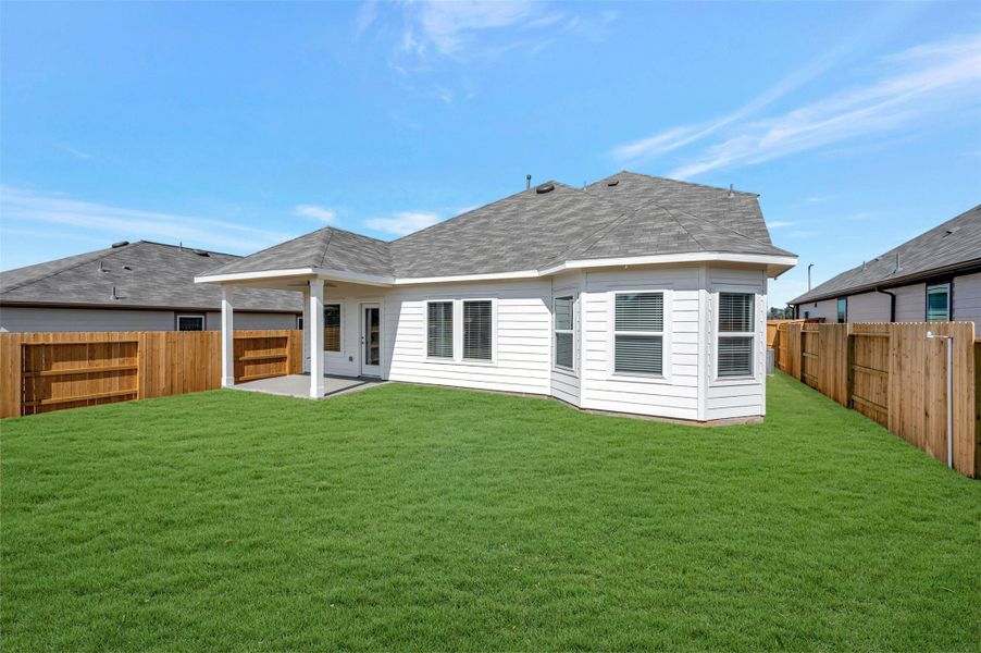 Exterior details and patio area of a home in Lone Star Landing, Montgomery (Image 22).