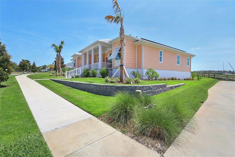 Front exterior of a new home in , Lady Lake, FL, highlighting curb appeal (Image 24).