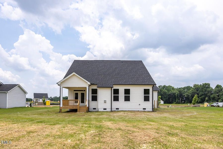 Front exterior of a new home in Tobacco Road, Angier, NC, highlighting curb appeal (Image 123). Front exterior of a new home in Tobacco Road, Angier, NC, highlighting curb appeal (Image 123).