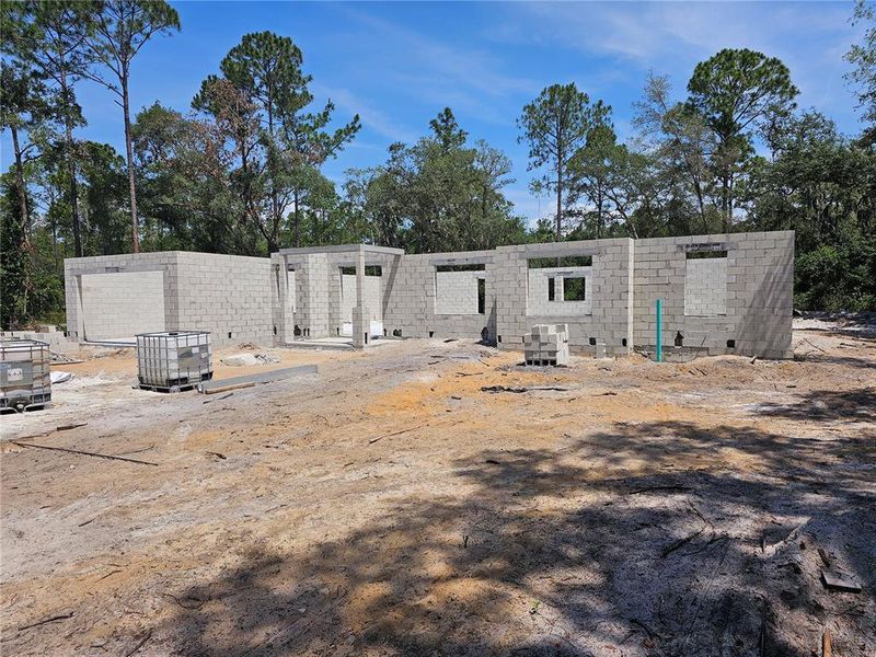 Front exterior of a new home in , Eustis, FL, highlighting curb appeal (Image 13).