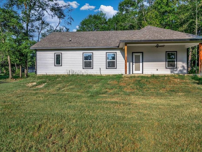 Front exterior of a new home in , Lufkin, TX, highlighting curb appeal (Image 20).