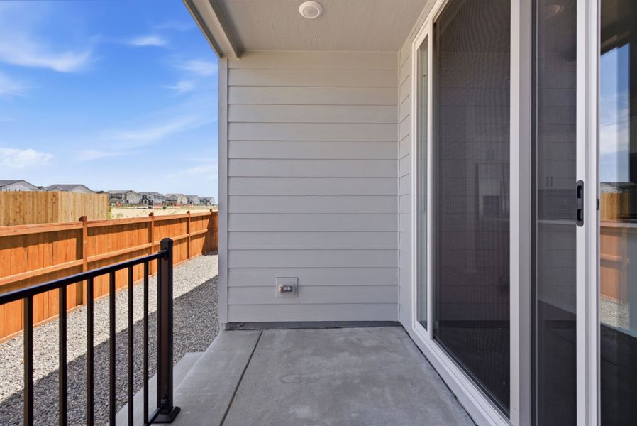 Exterior details and patio area of a home in Sky Ranch, Watkins (Image 24). Exterior details and patio area of a home in Sky Ranch, Watkins (Image 24).