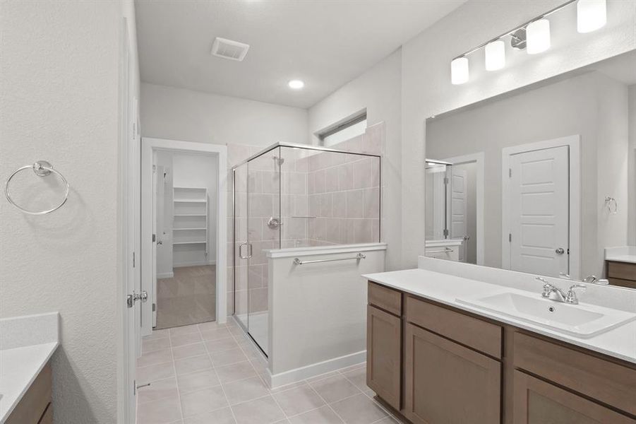 Primary Bathroom in the Willow home plan by Trophy Signature Homes – REPRESENTATIVE PHOTO Primary Bathroom in the Willow home plan by Trophy Signature Homes – REPRESENTATIVE PHOTO