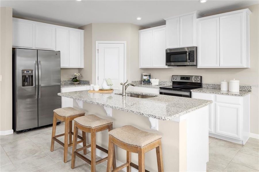 Furnished interior view inside a new home in Ashton Covey, Winter Haven (Image 14).
